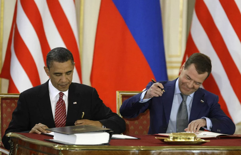 Barack Obama and Dmitry Medvedev signing START in 2010