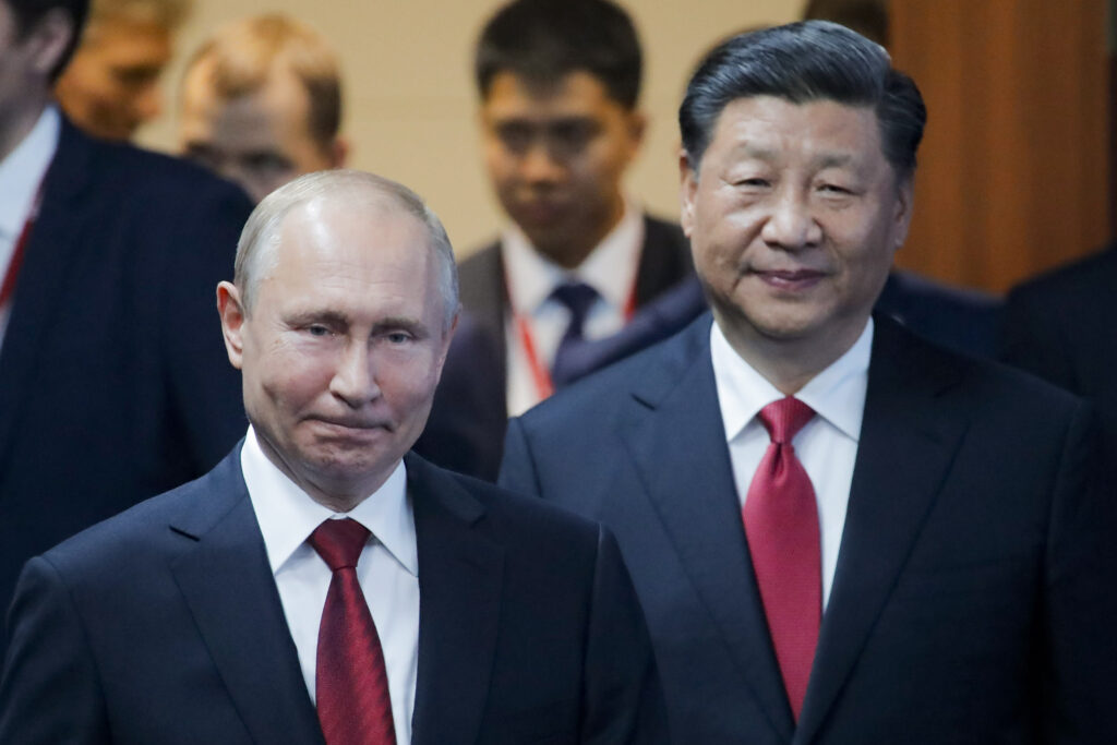 Pic of Presidents Putin (left) and Xi