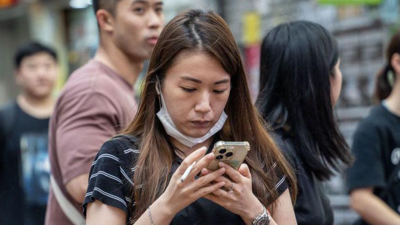 People in Hong Kong now face a year in jail if they refuse to give police their phone