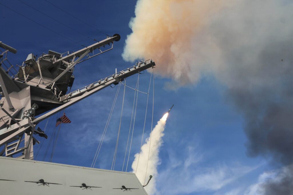Arleigh Burke-class guided-missile destroyer USS Thomas Hudner (DDG 116) fires a Tomahawk land attack missile, while underway, Mar. 21, 2026. (U.S. Navy Photo)